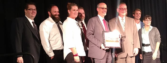 Infinity Inc. staff receives the Chamber Small Business of the Year award