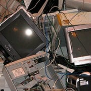 stack of old business electronic devices like computers