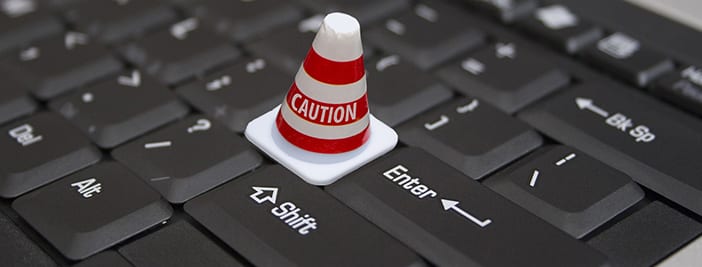 warning cone on keyboard to show caution and liability