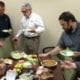 Infinity employees at office potluck